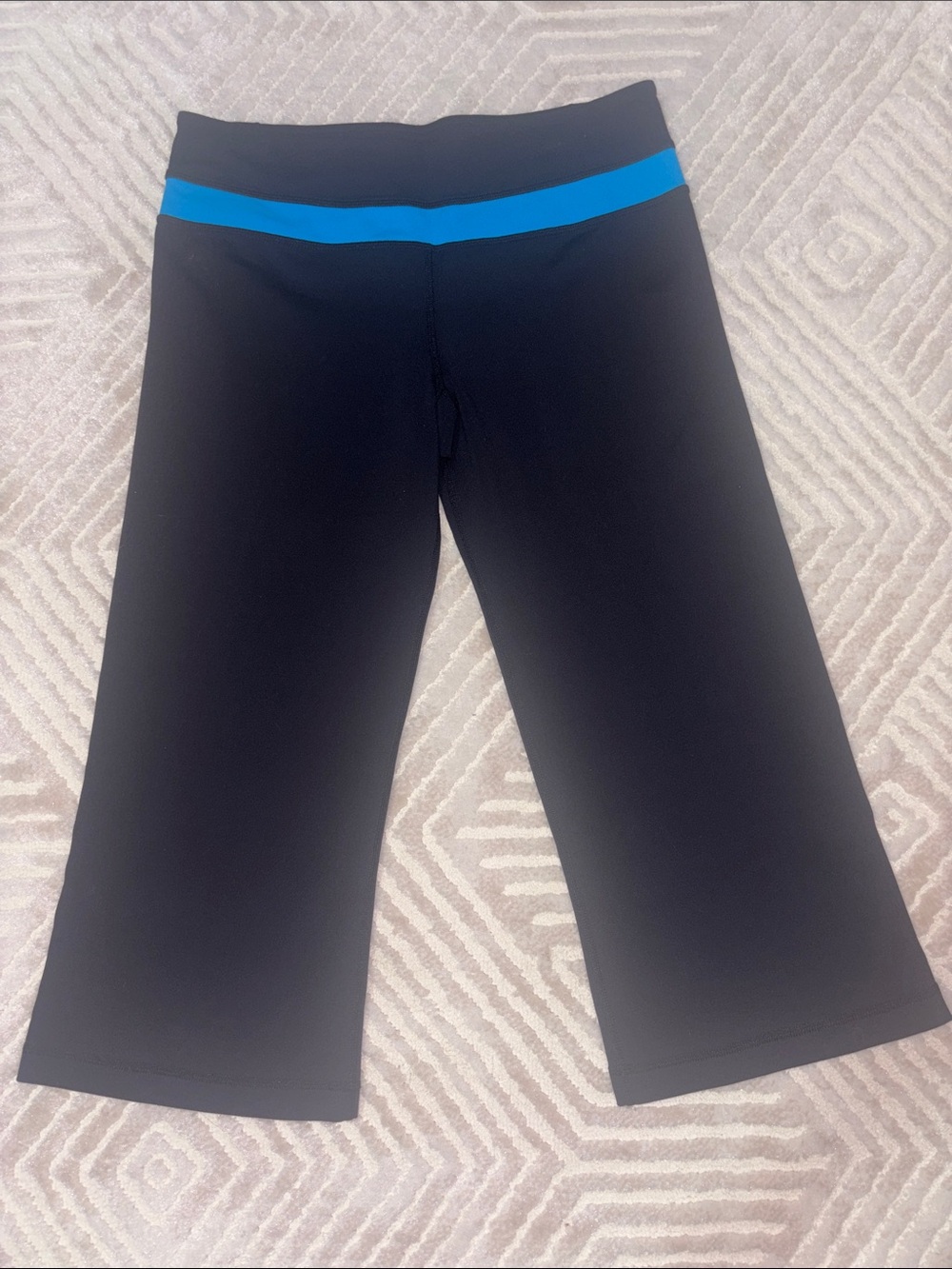 Lululemon Women’s Black Capri Leggings with Blue Waistband